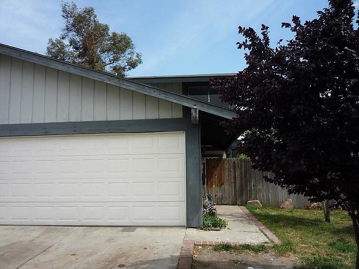 This twin home has 2 car garage.