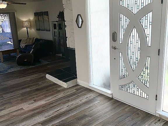 Entry w gas/wood fireplace 