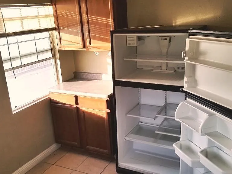 Kitchen with Fridge and Stove