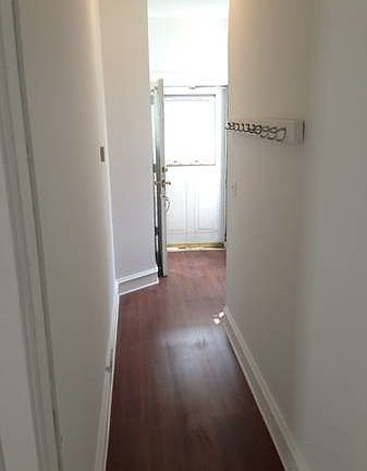 Front entrance front inside, hallway has new laminate floori