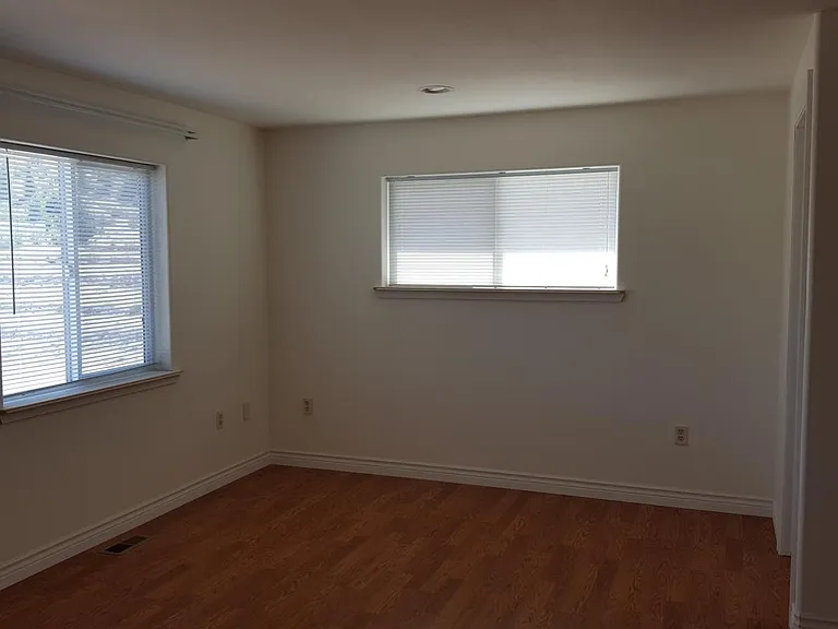 First floor bedroom with walk-in closet and adjoining full bathroom