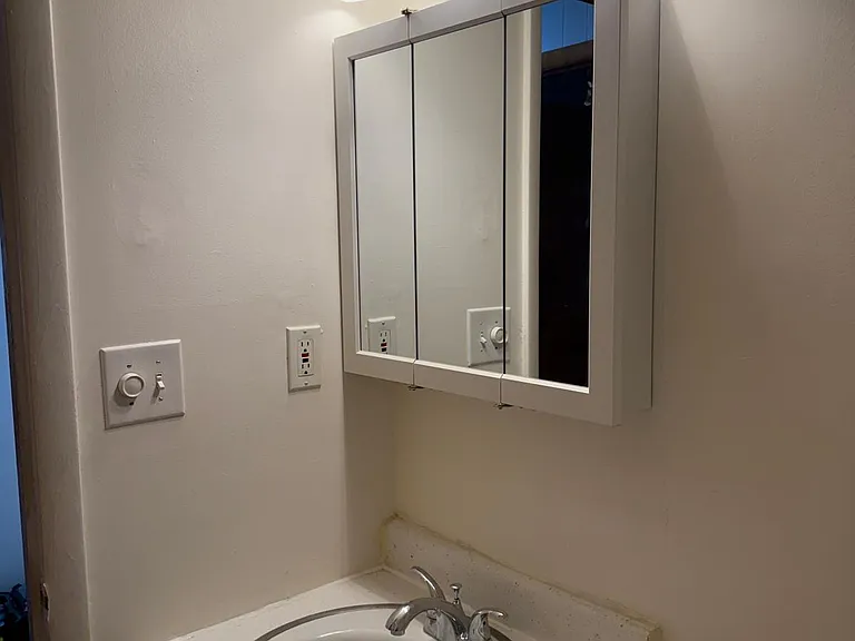 New paint, new flooring, updated cabinet and lighting.