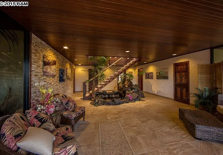 The Sound of the Waterfall Pond Terrarium Room on Ground Level gives our home a tranquil setting throughout