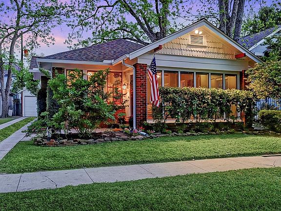 Lush landscaping on a quiet street.