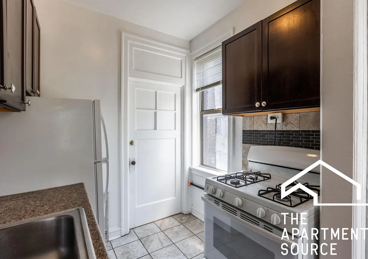 1367 W Estes Ave — Photo 1