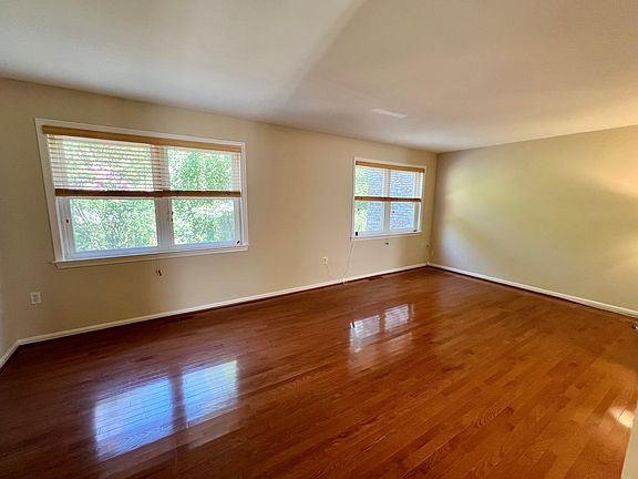 Huge living room with wood floors