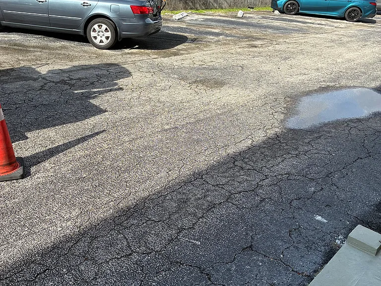 GATED PARKING LOT.