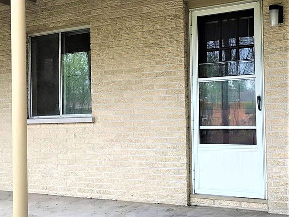 Patio Faces Wooded Yard