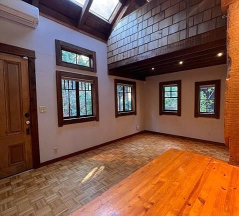 Living Area With view of upper loft
