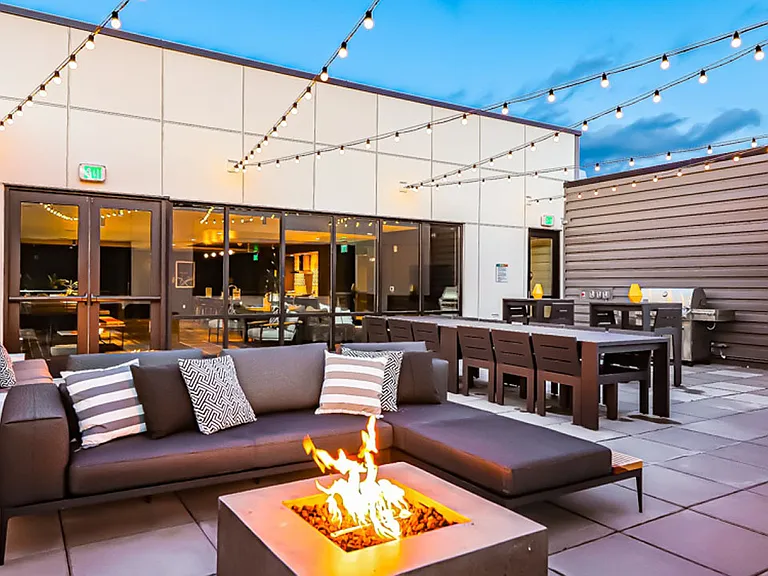 Griffis Shoreline apartment rooftop deck and fire pit.