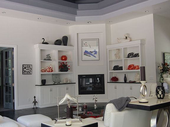Lots of built-ins and huge windows bring the outdoors in.