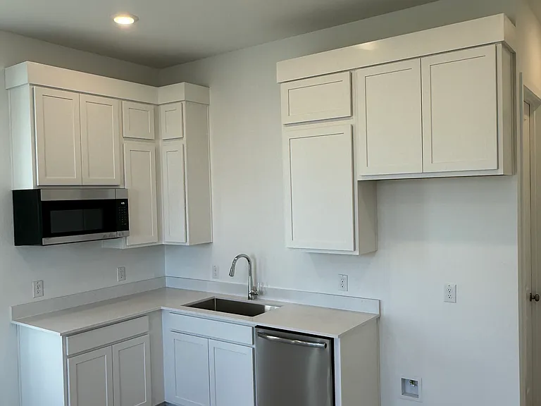 _ Kitchenette featuring:
o Full-size refrigerator
o Microwave
o Kitchen sink