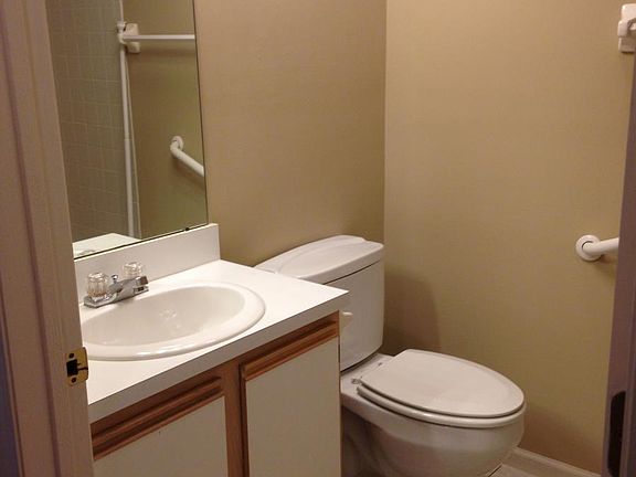 hall bathroom which includes tub shower