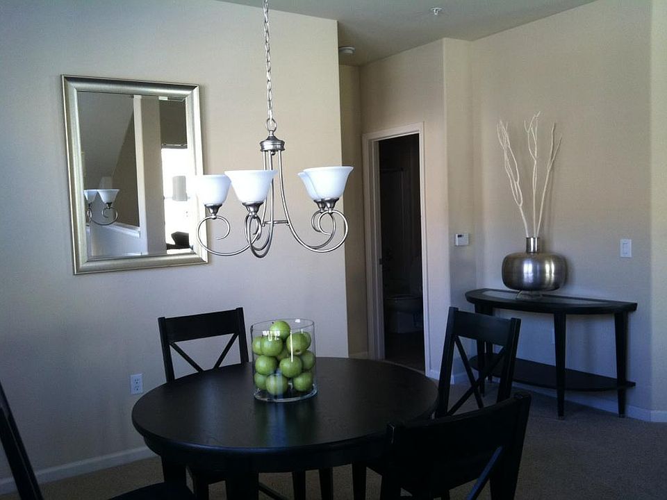 Dining with peek view to 2nd bathroom door
