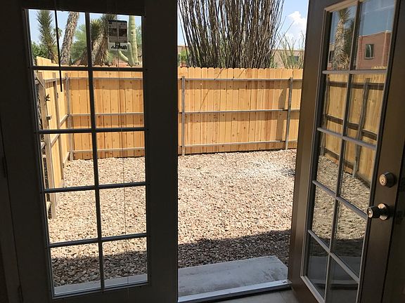 French doors to private fenced yard