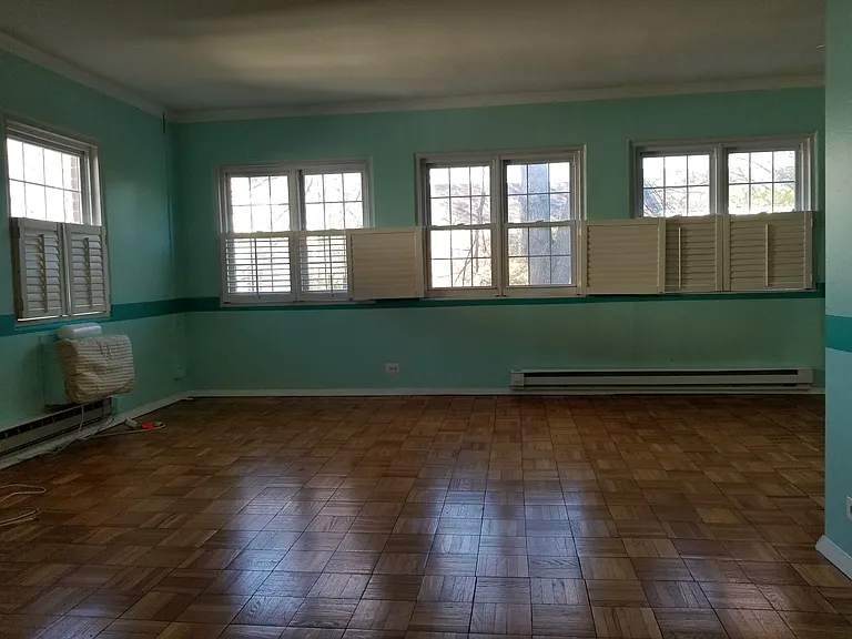 Living Room -- note that the current paint color is more neutral beige