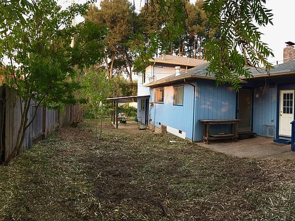 The long back yard has two patios to enjoy.