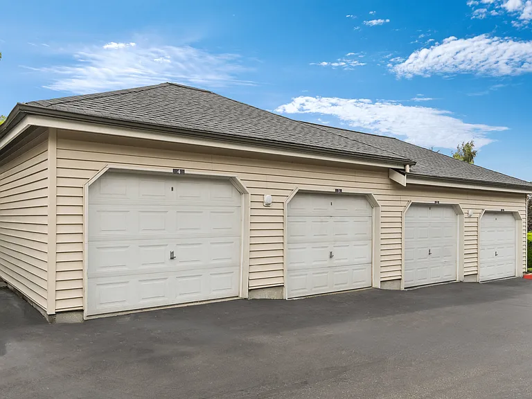 Secure private garages available for extra storage and convenient parking.