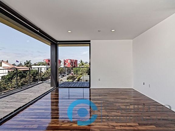 4th image of 3761 Centre St APT 304