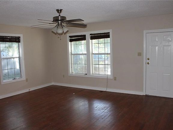 Spacious Living Area with Nice Hardwood Floors