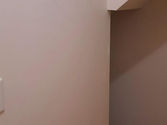 Stairway leading down to laundry area