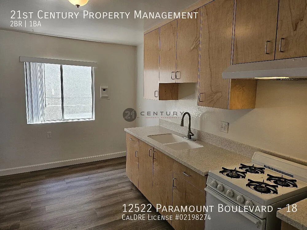 "Good sized 2-Bedroom Haven in Downey Cozy Comfort Awaits at 12522 Paramount Blvd, Unit 18!" — Photo 4