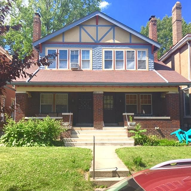 Covered front porch and lawn.