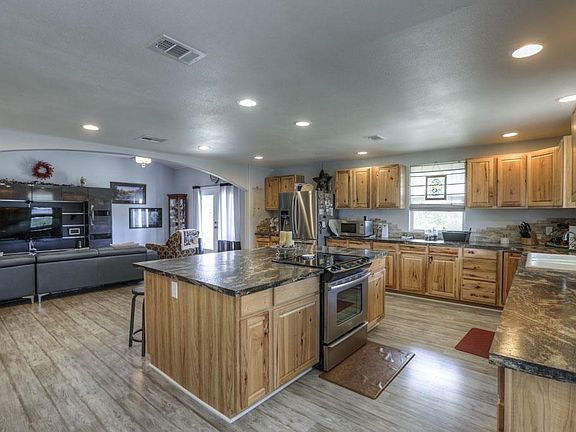 Entertain your guest in this hugh gourmet kitchen overlooking the Living area