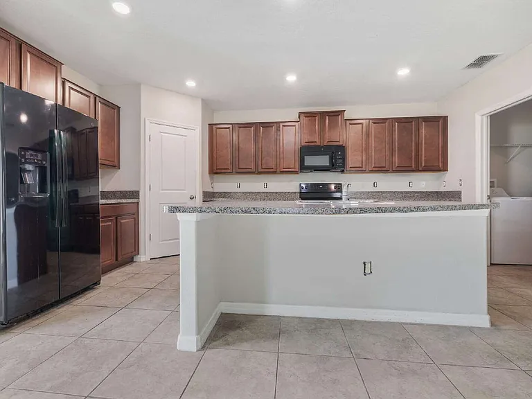 7407 Rosy Periwinkle Ct — Photo 6