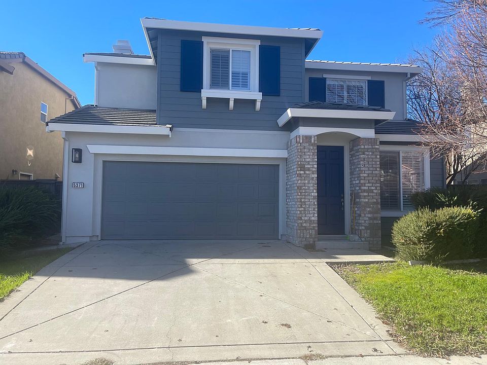 Exterior of the home with brand new paint and new home look