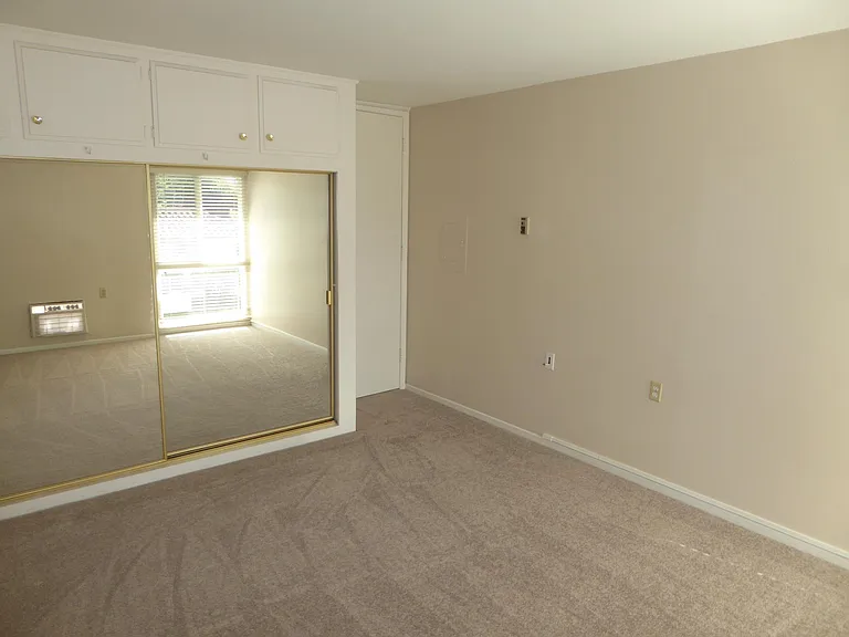 Mirrored wardrobe in Master bedroom