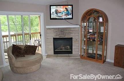 Living room
						:
						Spacious living area with vaulted ceilings.