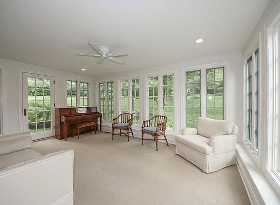 Sunroom with 3 walls of windows