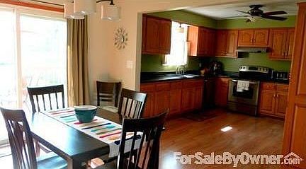 Spacious Dining and Kitchen
						:
						Sliding doors from dining room to new deck