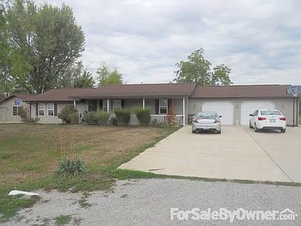 Front
						:
						Not included in photo is the large lot to the right of the driveway (North side)
