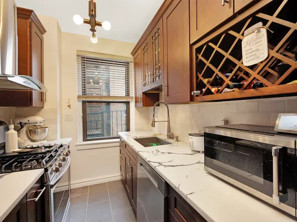 77-16 Austin Street image 1 of 14