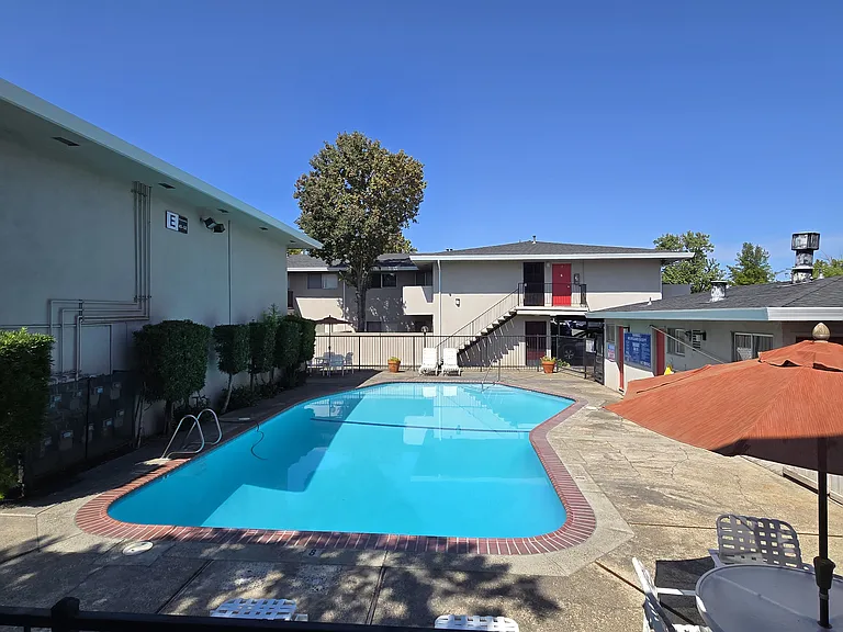 Cool off and unwind in our sparkling swimming pool_your perfect place to relax, soak up the California sunshine, and enjoy the outdoors.