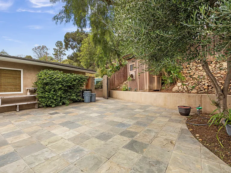 Mid-level patio. Note a patio set and umbrella are now in this space.