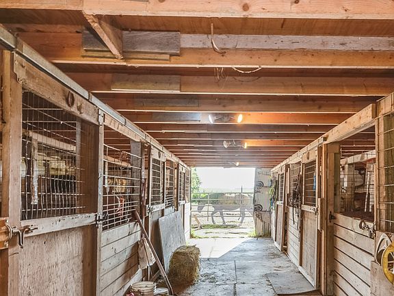 6 stalls with tack room and hay loft!