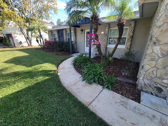 Entrance, orchids included.