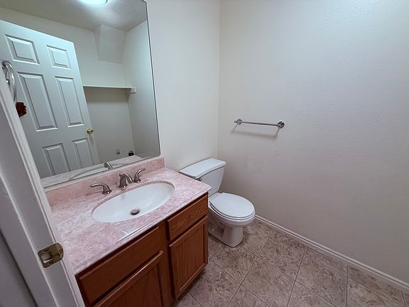 Main floor half bath with laundry hookups