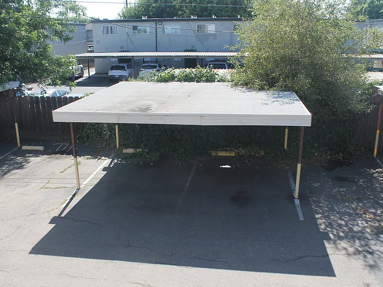 One assigned covered parking spot