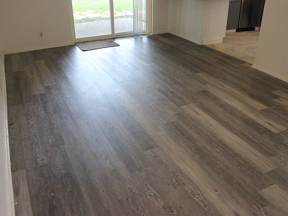 den with new light grey flooring