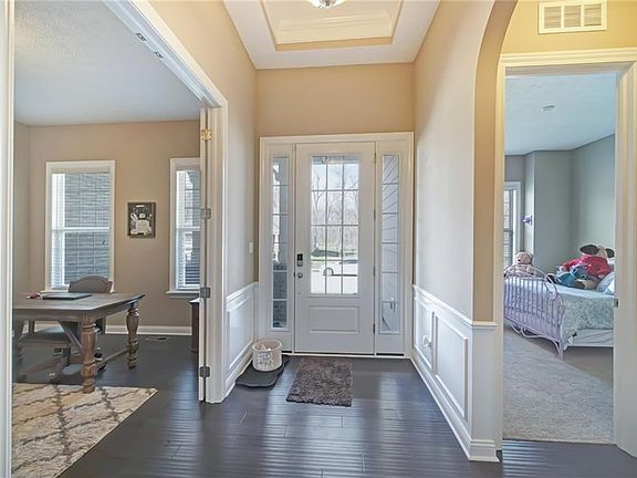 Entrance, looking from Great room to office on left and 2nd ensuite on the right