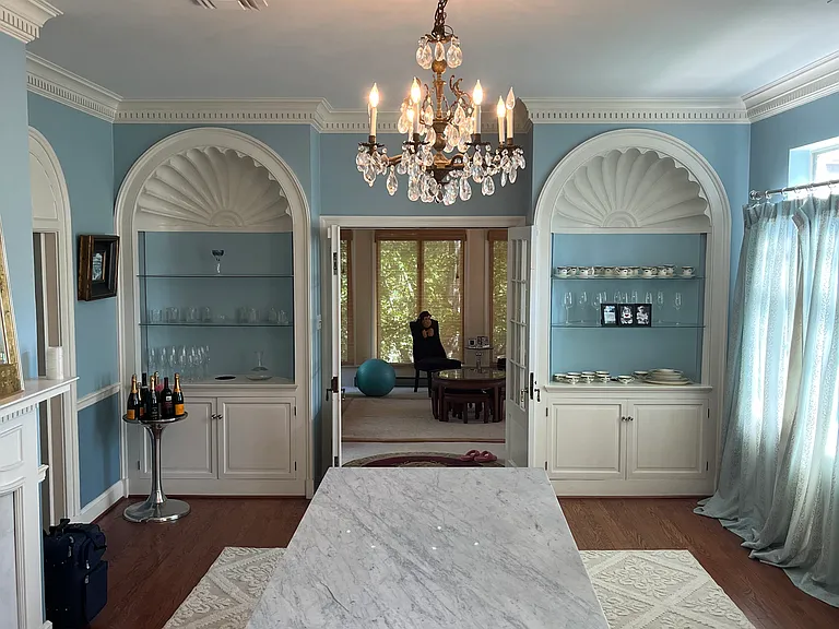Formal dining room - leads into the sunroom. Gas fireplace.