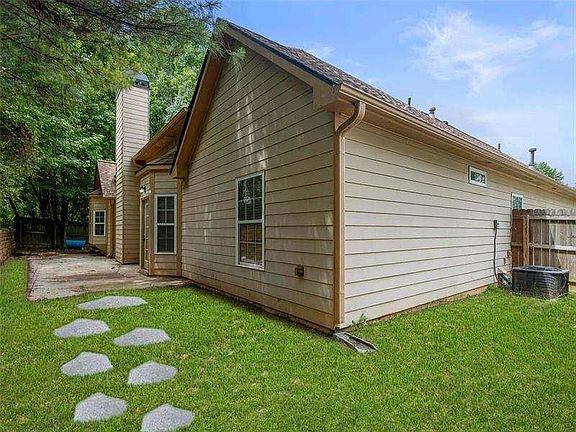 Backyard entrance from the left side of the house