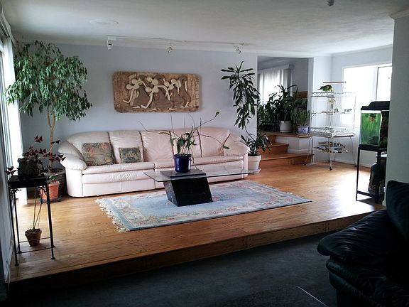 Living Room
						:
						Gas/wood burning all-marble/granite fireplace