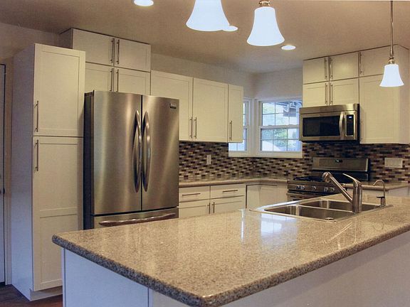 Kitchen is to your right when you walk in the door. Plenty of storage and counter space. Appliances included