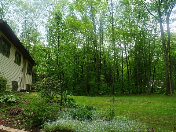 From driveway facing west. 