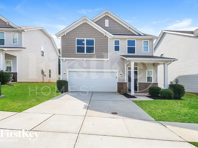 9018 Evans Woods Dr — Photo 1